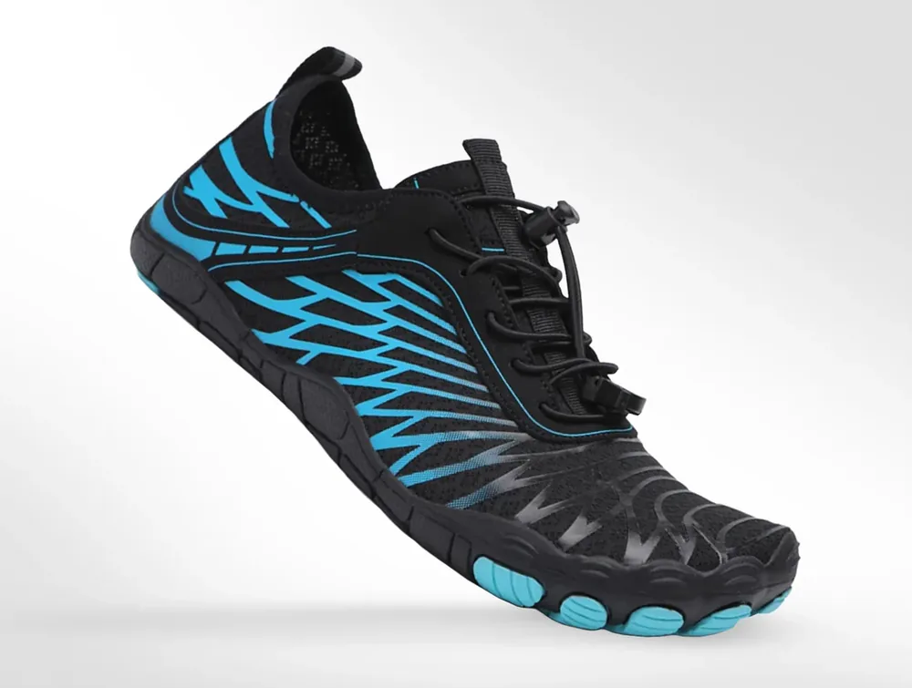 Vorniyx barefoot shoe in black with an aqua wave print, seen from a three-quarter angle